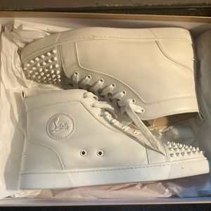 high top Christian louboutin sneaker.